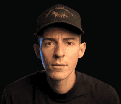 Kallaway – Short Form Academy Young man wearing a black cap with getWSOdownload logo.